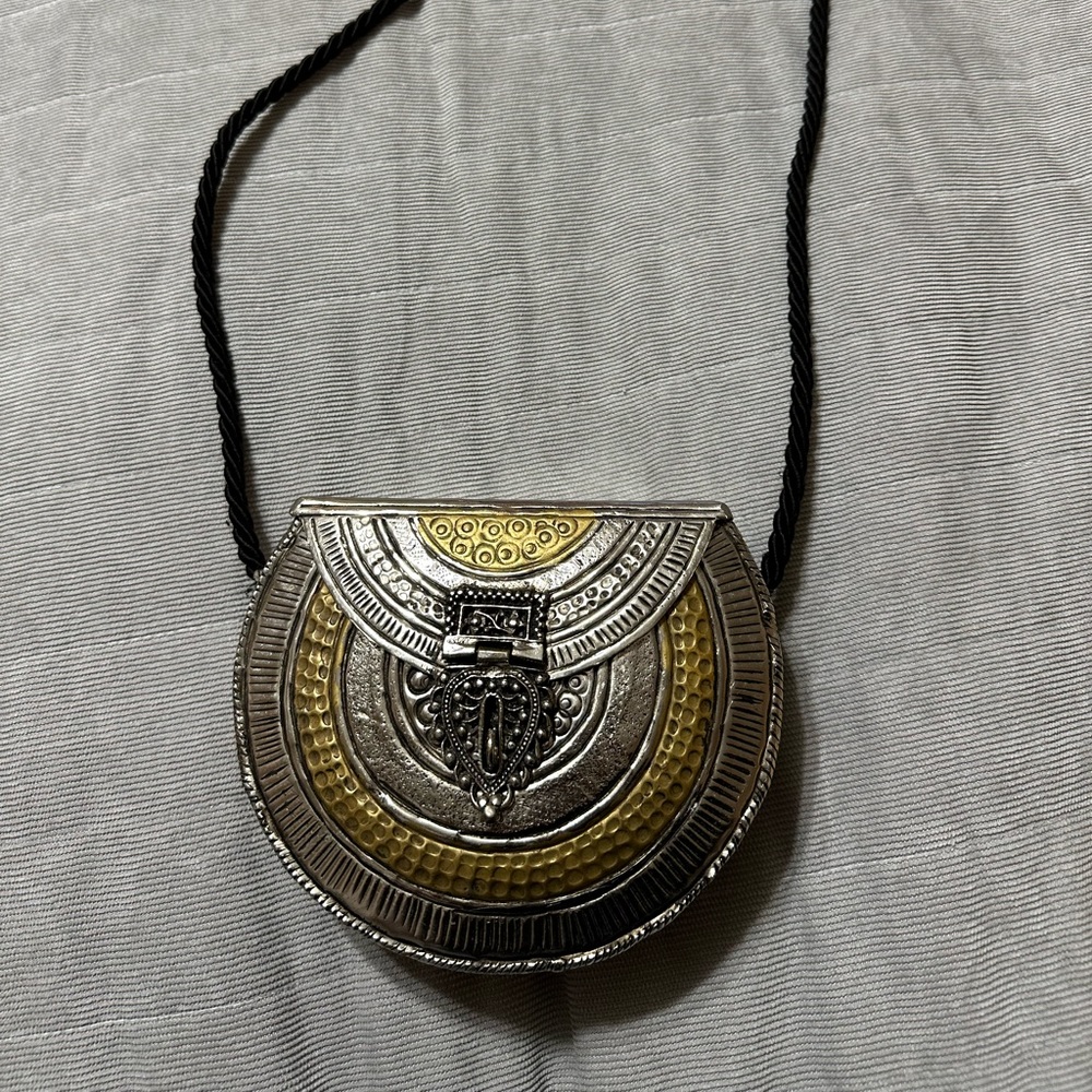 Free people vintage metal bag